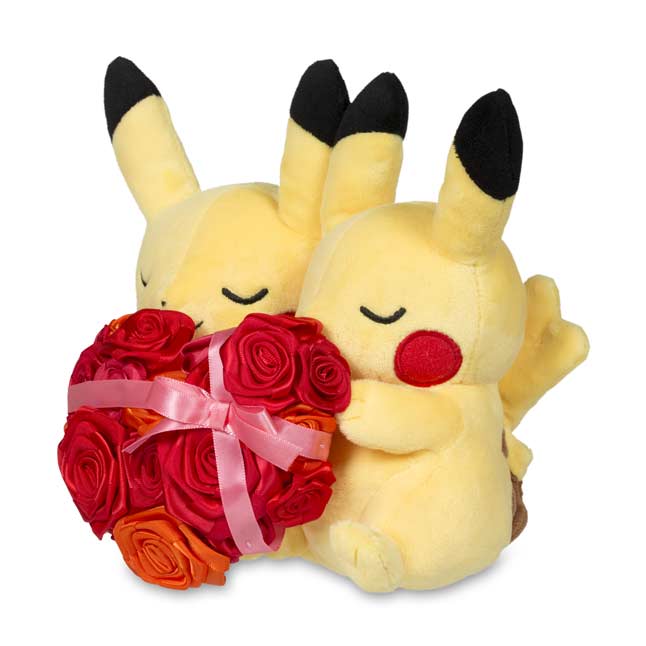 pikachu holding a heart plush